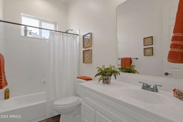 full bathroom with vanity, toilet, hardwood / wood-style flooring, and shower / bath combo