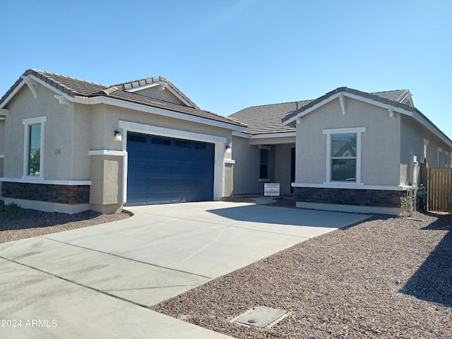 ranch-style house with a garage