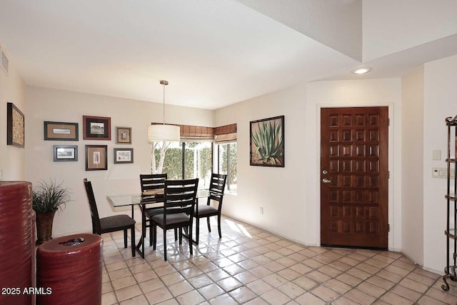 9115 N 101st Way, Scottsdale, AZ 85258 - dining area with light tile patterned floors and recessed lighting
