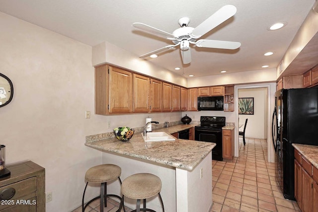 9115 N 101st Way, Scottsdale, AZ 85258 - kitchen with black appliances, a sink, a peninsula, open shelves, and a ceiling fan