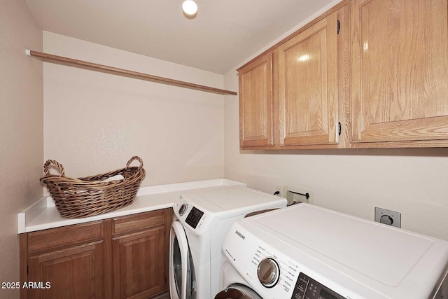 9115 N 101st Way, Scottsdale, AZ 85258 - laundry area featuring cabinet space and washing machine and dryer