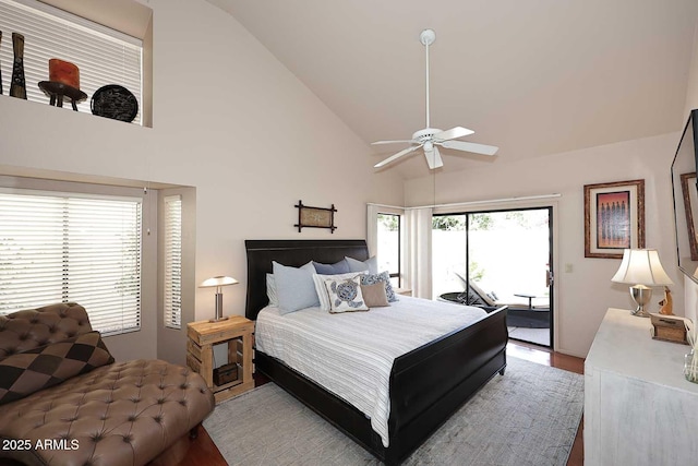 9115 N 101st Way, Scottsdale, AZ 85258 - bedroom with access to exterior, wood finished floors, high vaulted ceiling, and ceiling fan
