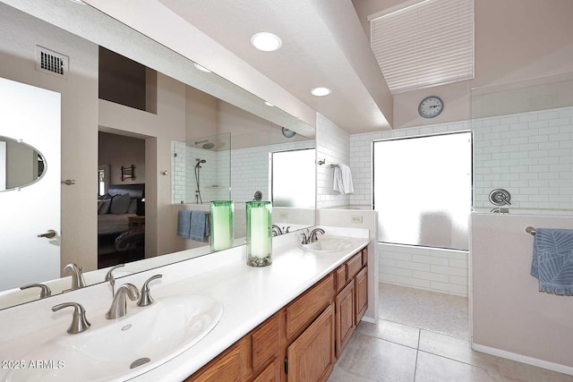 9115 N 101st Way, Scottsdale, AZ 85258 - ensuite bathroom with walk in shower, tile patterned floors, double vanity, and recessed lighting