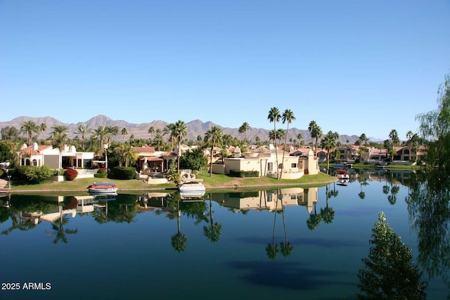 9115 N 101st Way, Scottsdale, AZ 85258 - water view featuring nearby suburban area and a mountainous background