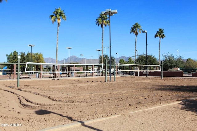 9115 N 101st Way, Scottsdale, AZ 85258 - view of community with volleyball court and a mountain view