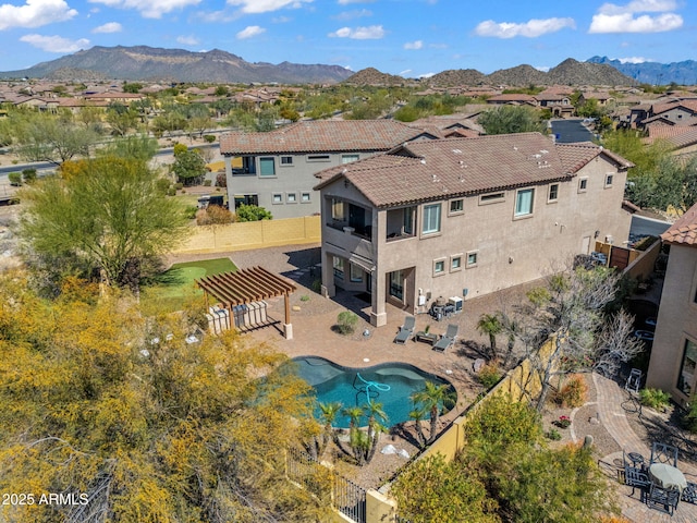 drone / aerial view with a mountain view and a residential view