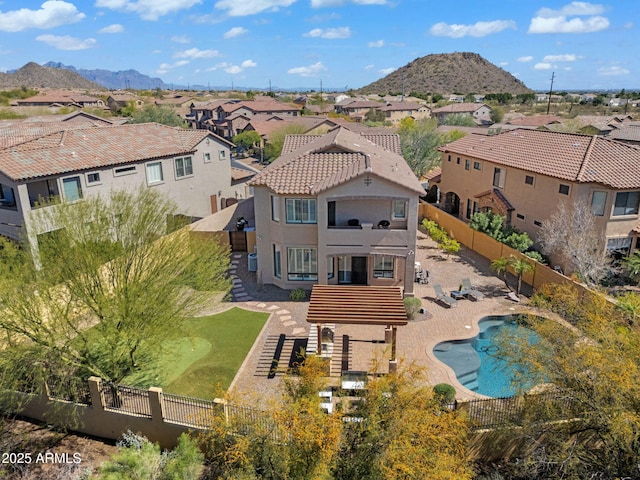 drone / aerial view with a mountain view and a residential view
