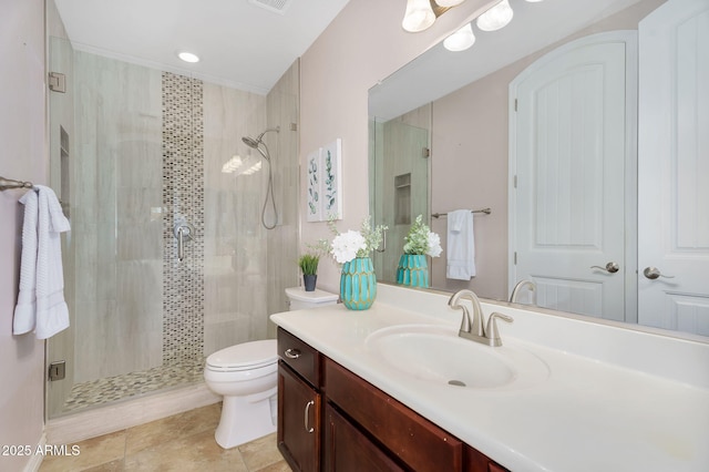 full bath with visible vents, toilet, a stall shower, tile patterned floors, and vanity