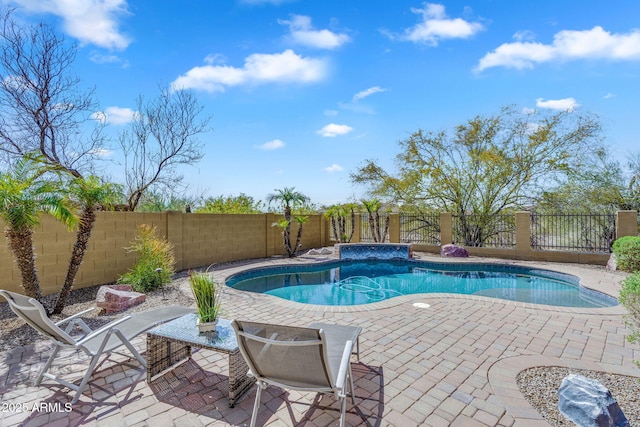 view of pool featuring a fenced backyard, a fenced in pool, and a patio