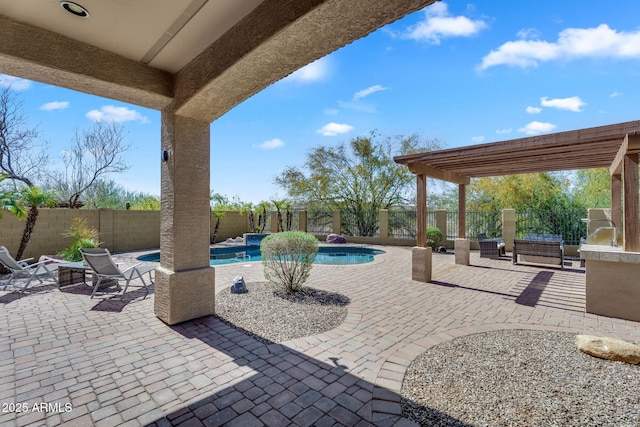 view of patio featuring a fenced backyard and a fenced in pool