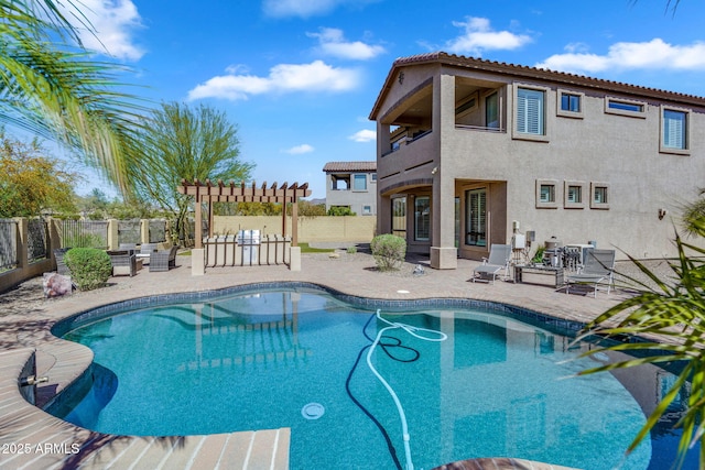 view of pool with a fenced in pool, a patio area, a pergola, and a fenced backyard