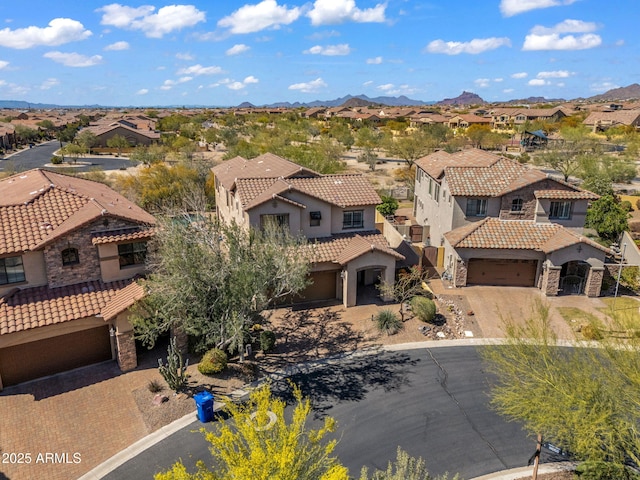 aerial view featuring a mountain view and a residential view