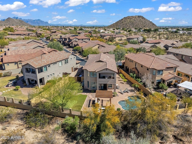 drone / aerial view with a residential view and a mountain view