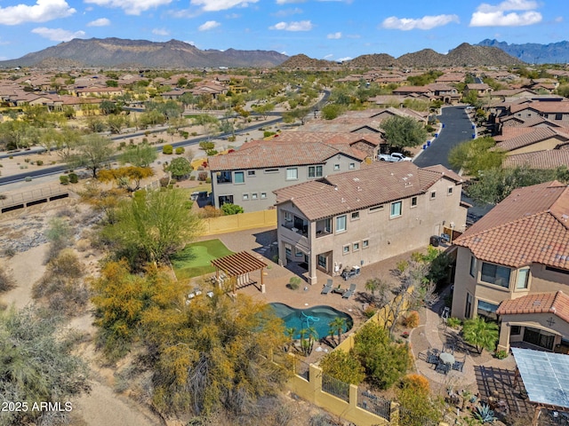bird's eye view with a residential view and a mountain view