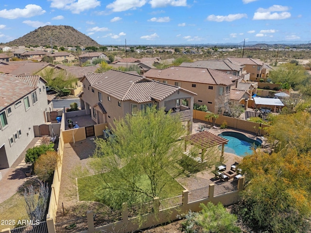 birds eye view of property with a residential view and a mountain view