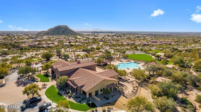 birds eye view of property featuring a mountain view