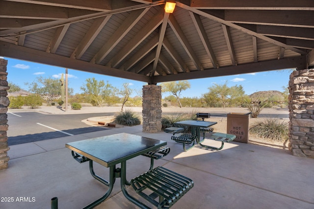 view of patio / terrace with a gazebo and outdoor dining space