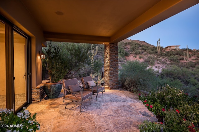 view of patio / terrace with a mountain view