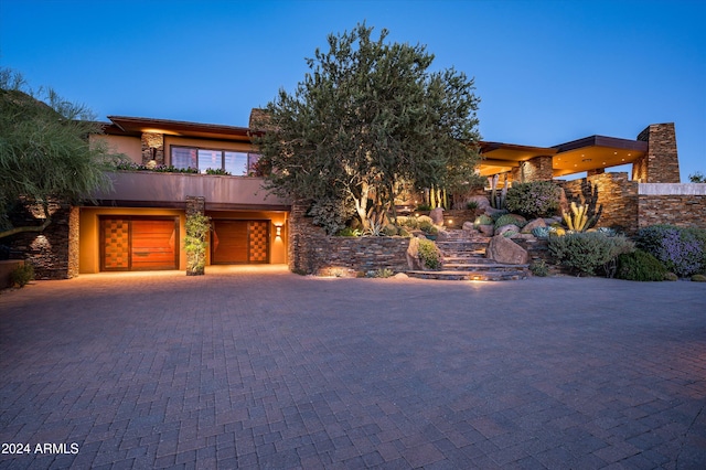 view of front of property with a garage