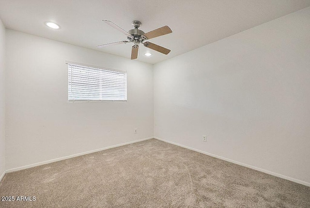 carpeted empty room featuring recessed lighting, ceiling fan, and baseboards