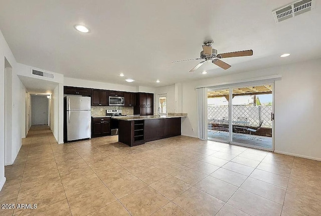 kitchen with visible vents, recessed lighting, dark brown cabinets, and stainless steel appliances