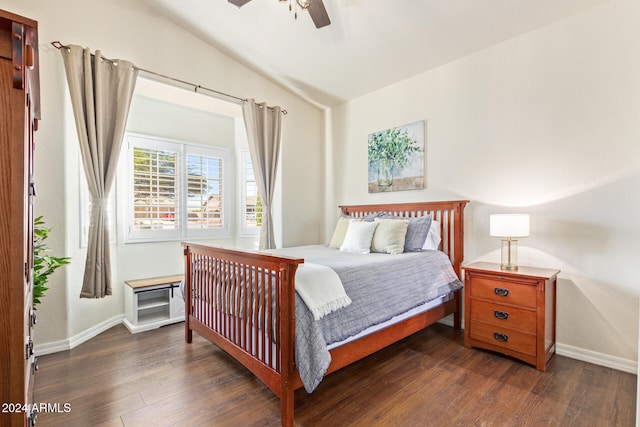 bedroom featuring ceiling fan, vaulted ceiling, and dark hardwood / wood-style floors