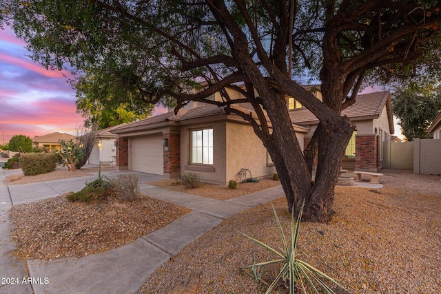 view of front of property with a garage