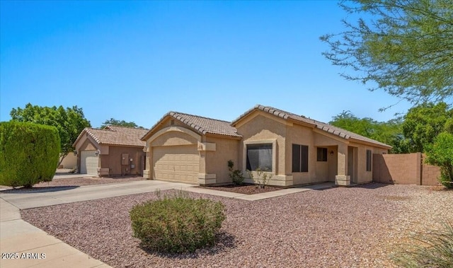 10646 E Enid Ave, Mesa, AZ 85208 - single story home featuring stucco siding, concrete driveway, a tiled roof, and an attached garage