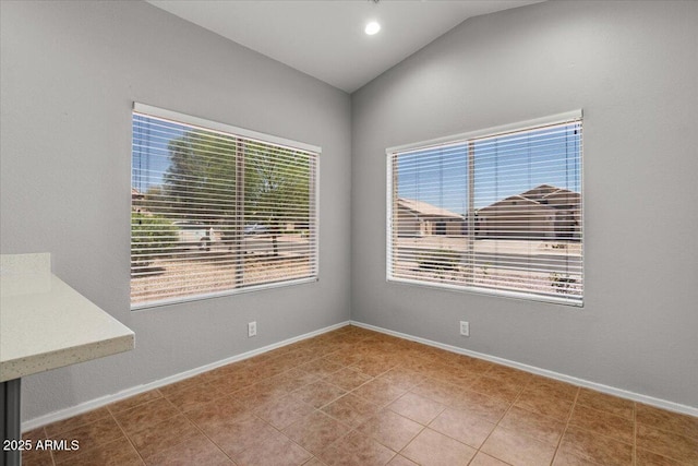 10646 E Enid Ave, Mesa, AZ 85208 - unfurnished room featuring lofted ceiling and baseboards