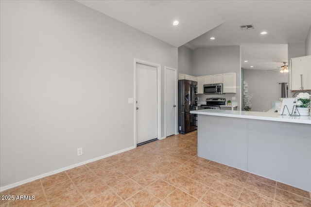 10646 E Enid Ave, Mesa, AZ 85208 - kitchen featuring appliances with stainless steel finishes, white cabinetry, a peninsula, light countertops, and recessed lighting