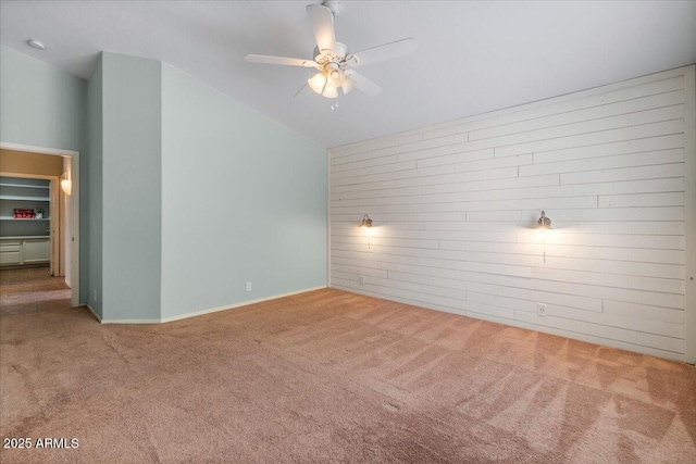 10646 E Enid Ave, Mesa, AZ 85208 - unfurnished room featuring carpet flooring, lofted ceiling, and ceiling fan