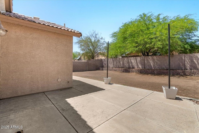 10646 E Enid Ave, Mesa, AZ 85208 - fenced backyard with a patio
