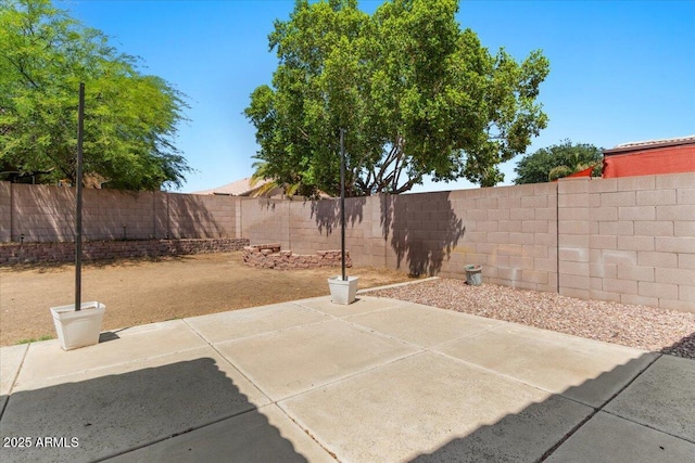 10646 E Enid Ave, Mesa, AZ 85208 - fenced backyard with a patio area
