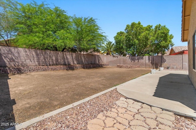 10646 E Enid Ave, Mesa, AZ 85208 - fenced backyard with a patio