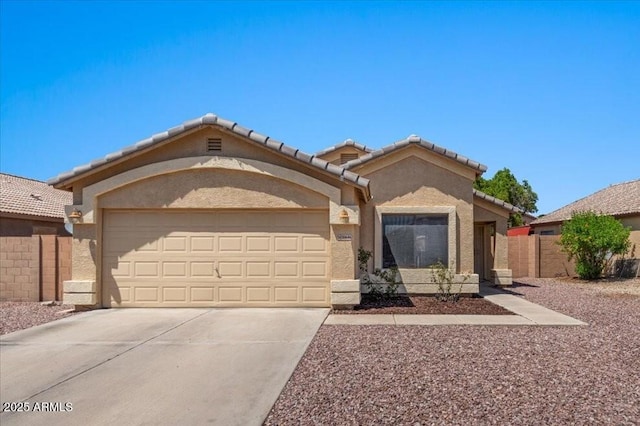10646 E Enid Ave, Mesa, AZ 85208 - view of front facade featuring stucco siding, driveway, a garage, and a tile roof