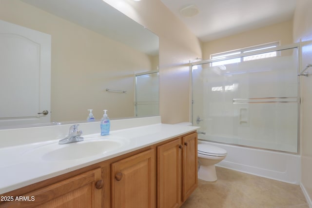 full bathroom with toilet, vanity, and combined bath / shower with glass door