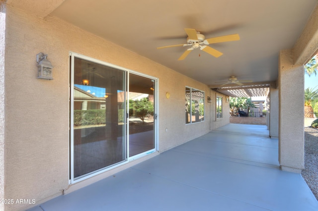 view of patio with ceiling fan