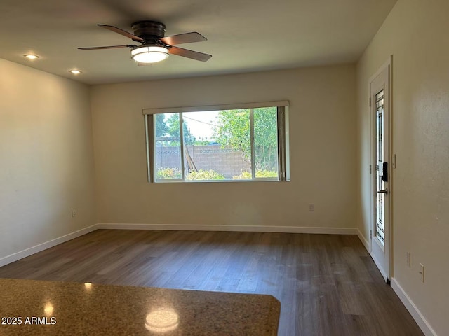 344 E Aepli Dr, Tempe, AZ 85282 - unfurnished room featuring dark wood-type flooring and a ceiling fan