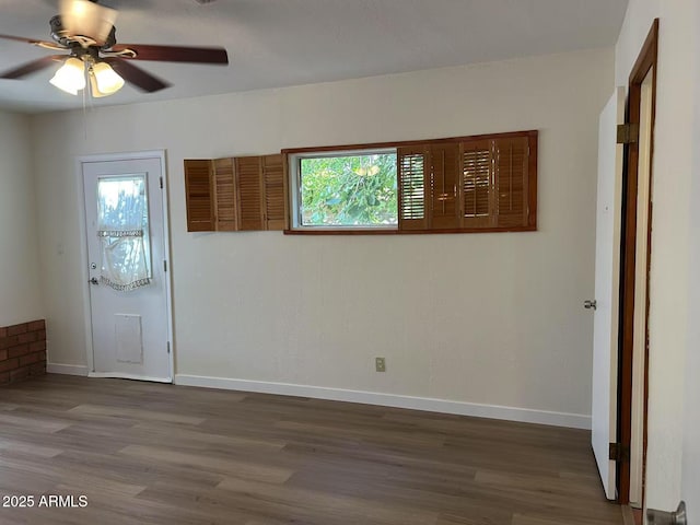 344 E Aepli Dr, Tempe, AZ 85282 - unfurnished room featuring a ceiling fan and wood finished floors
