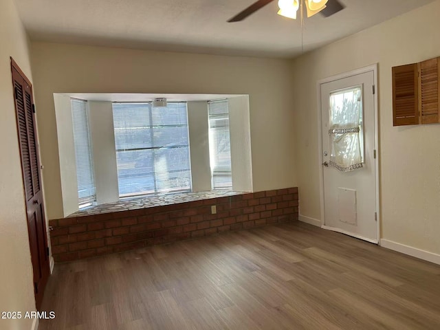 344 E Aepli Dr, Tempe, AZ 85282 - spare room featuring healthy amount of natural light, wood finished floors, and ceiling fan