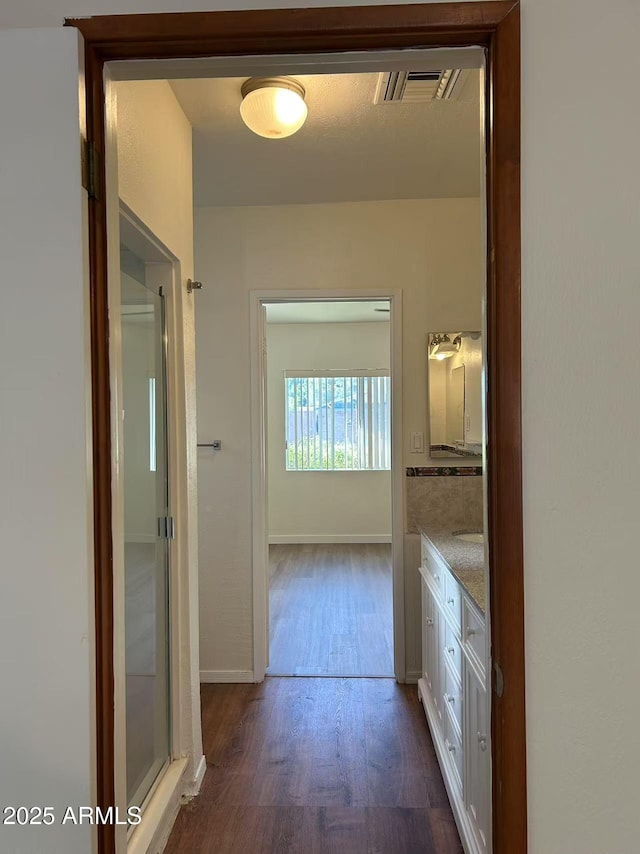 344 E Aepli Dr, Tempe, AZ 85282 - hallway with dark wood finished floors and baseboards