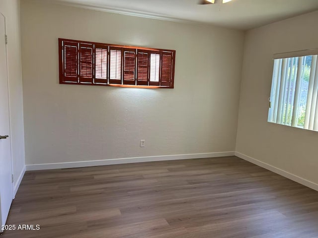 344 E Aepli Dr, Tempe, AZ 85282 - unfurnished room featuring wood finished floors and a ceiling fan