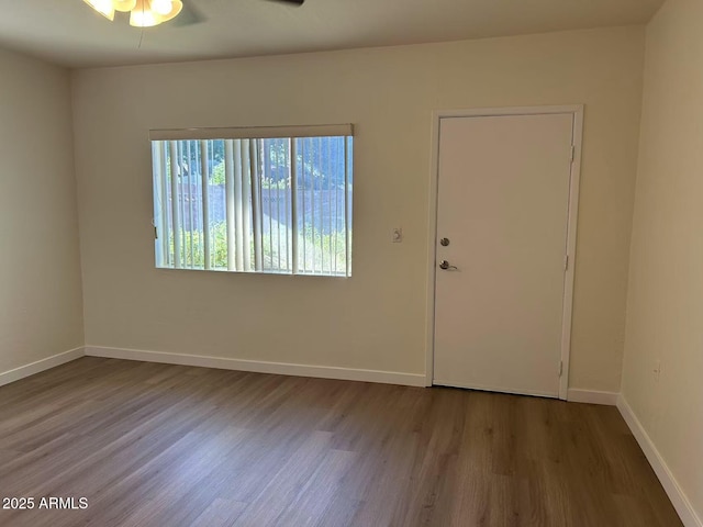 344 E Aepli Dr, Tempe, AZ 85282 - unfurnished room featuring wood finished floors and ceiling fan
