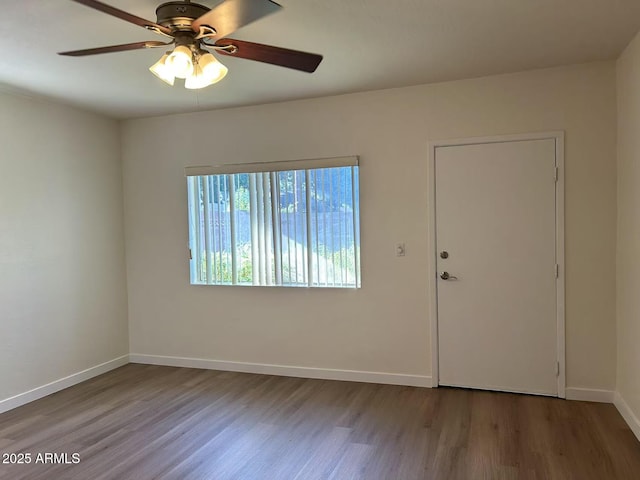 344 E Aepli Dr, Tempe, AZ 85282 - empty room with wood finished floors and ceiling fan