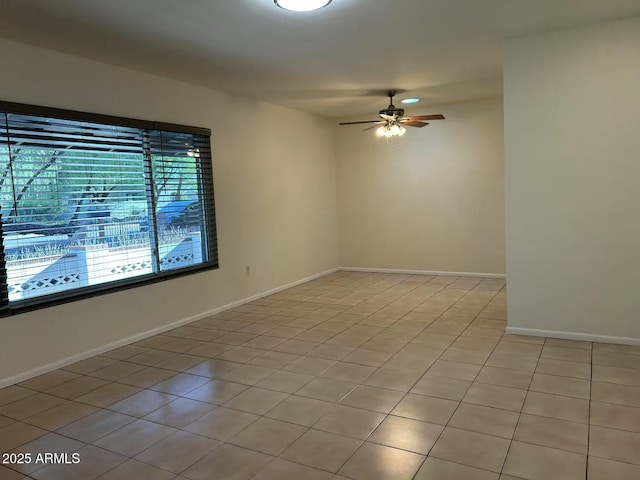 344 E Aepli Dr, Tempe, AZ 85282 - spare room featuring ceiling fan and light tile patterned floors