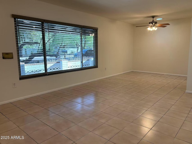 344 E Aepli Dr, Tempe, AZ 85282 - spare room featuring ceiling fan and baseboards