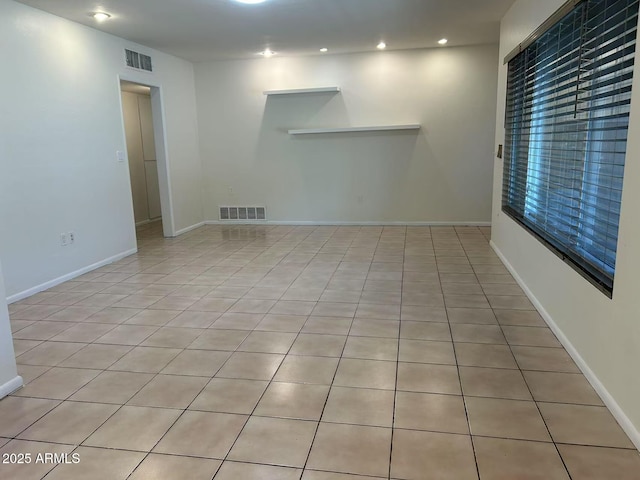 344 E Aepli Dr, Tempe, AZ 85282 - tiled empty room with recessed lighting and baseboards