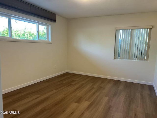 344 E Aepli Dr, Tempe, AZ 85282 - spare room with wood finished floors and baseboards