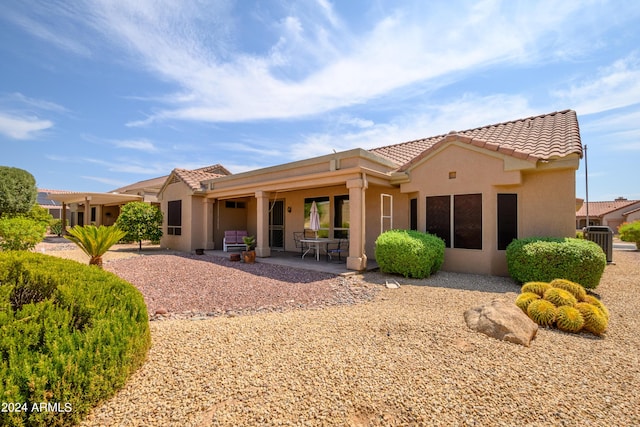 rear view of house with a patio area