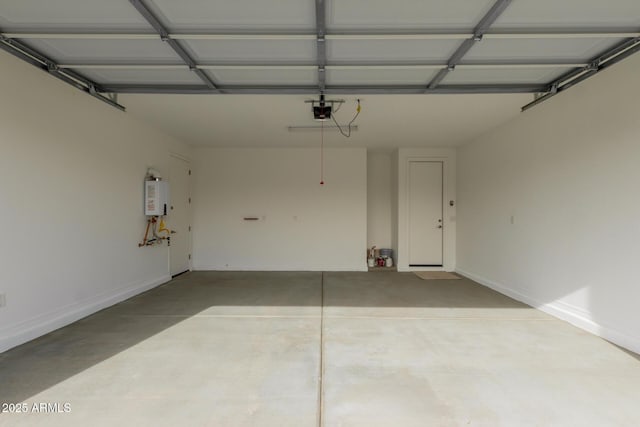 garage with a garage door opener and water heater